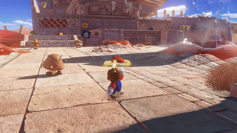 In a desert environment, Mario throws his cap at a goomba, a brown mushroom monster. As his hat lands on the goomba's head, mario becomes ethereal and zooms into the goomba's form, 'capturing' it. This takes place over the course of 1.5 seconds.

A similar scene plays out as mario 'captures' a bipedal turtle and an anthropomorphic bullet.  